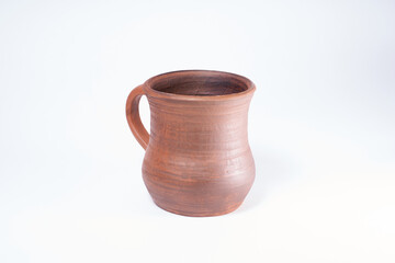 Pottery Craft, ceramic product with your own hands, made on a Potter's wheel, isolated on a white background.