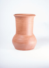 Pottery Craft, ceramic product with your own hands, made on a Potter's wheel, isolated on a white background.