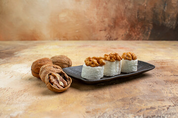 front view walnut confitures on light desk sweet honey candy