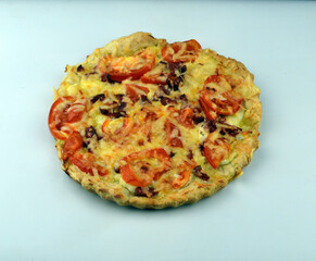 
fresh homemade pizza lies on the kitchen table