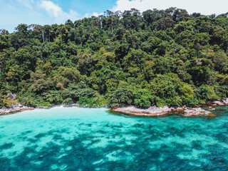 Clear blue sea on the island from the top view.