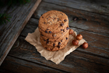 Chocolate cookies on wooden table.