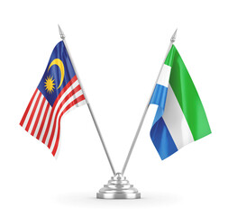 Sierra Leone and Malaysia table flags isolated on white 3D rendering