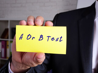 Business concept about A Or B Test H with inscription on the piece of paper.