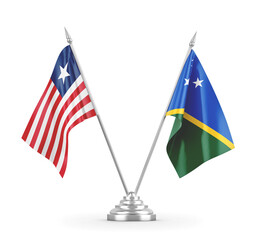 Solomon Islands and Liberia table flags isolated on white 3D rendering