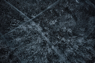 cracked ice texture, abstract seasonal winter cold background, natural ice, broken ice on a lake