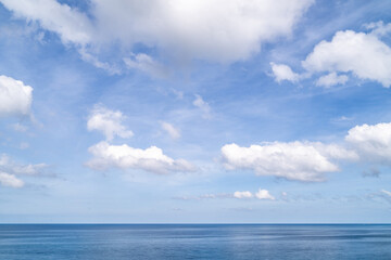 Plakat View of the beautiful Andaman sea with fluffy wihte clouds in Phuket, Thailand