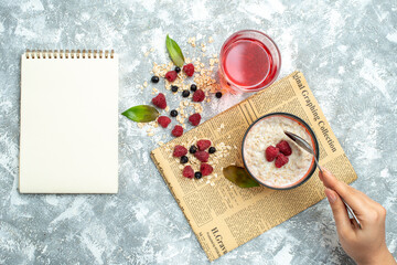 top view delicious porridge with raspberries on a light background morning photo oatmeal sweet breakfast