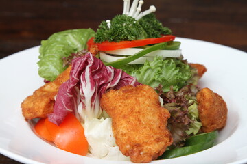 Mixed salad with fried chicken