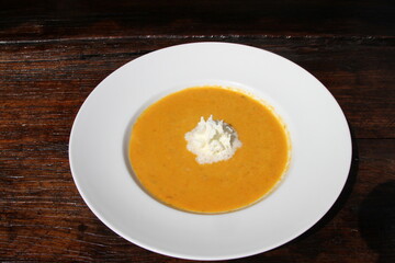 Carrot soup with whipped cream