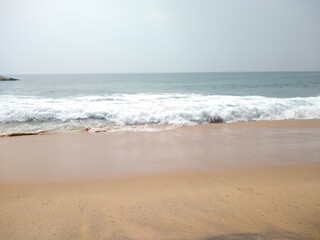 Fototapeta na wymiar Waves on the beach seascape view, Kurumpanai beach in Tamilnadu, India