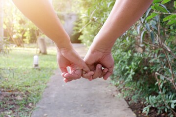 couple holding hands