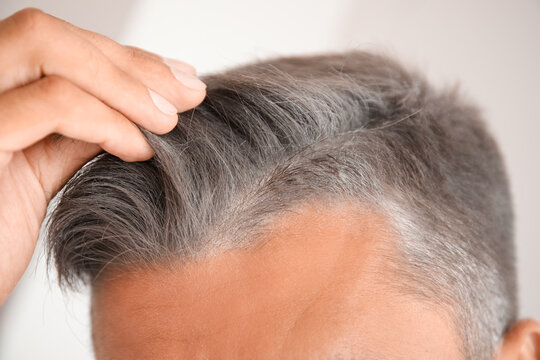 Man with graying hair, closeup