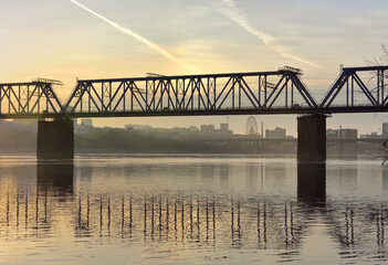 Dawn over the bridge over the Ob