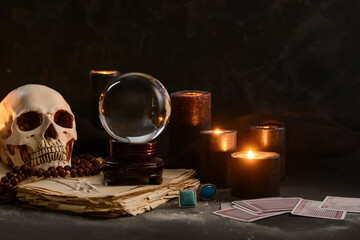 Accessories of fortune teller on table
