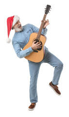 Naklejka premium Senior man in Santa hat playing guitar on white background