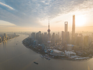 Obraz premium Aerial view of the sunrise in Lujiazui, the financial district in Shanghai, China.