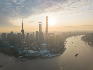 Naklejka premium Aerial view of the sunrise in Lujiazui, the financial district in Shanghai, China.