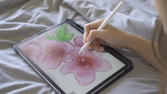 Art designer drawing digital painting or flower pattern design.