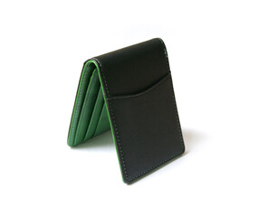 Blank green and black wallet isolated on white background . Open wallet . 