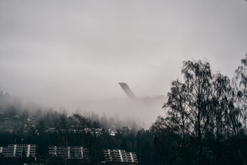 Holmenkollen in Dececmber. Fog and rain is the main weather in Oslo in December 2020.