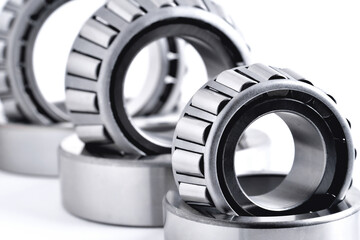 roller bearing on a white background close-up, blur as an artistic device