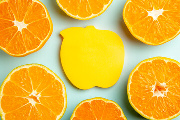 top view fresh tangerine slices with sticker on a light-blue background photo fruit color juice citrus orange