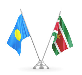 Suriname and Palau table flags isolated on white 3D rendering