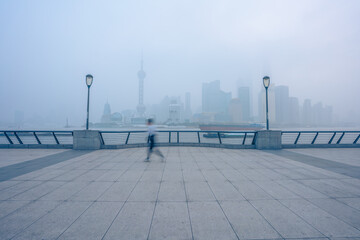 The bund in Shanghai, on a thick foggy day.