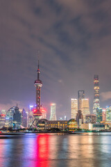 Night view of Lujiazui, the financial district and modern skyline in Shanghai, China.