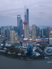 Aerial view of lujiazui, the financial district and modern skyline in Shanghai, China, on a cloudy day.