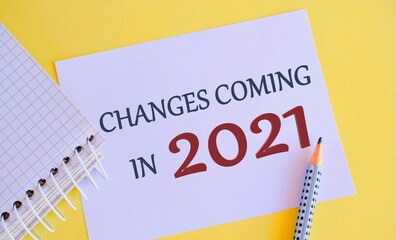 Changes Coming in 2021 written on white paper. Text sign showing Changes Is Coming. Conceptual...