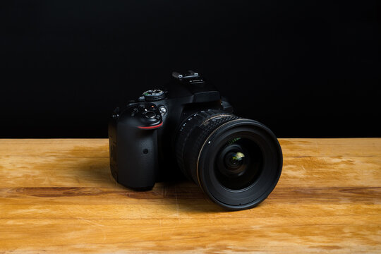 Reflex dslr camera on black background