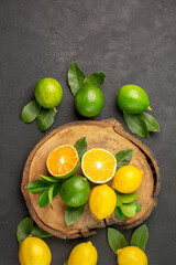top view fresh lemons on dark floor lime sour fruit citrus