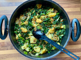Healthy Organic Vegan Swiss Chard Food with Potatoes in Pan. Vegetarian.