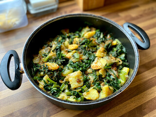 Healthy Organic Vegan Swiss Chard Food with Potatoes in Pan. Vegetarian.