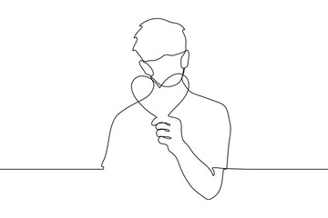 man in a mask holds out a paper heart to the viewer. one line drawing of a man in love giving a heart shaped greeting card