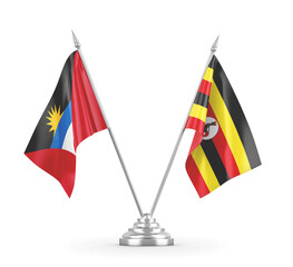 Uganda and Antigua and Barbuda table flags isolated on white 3D rendering 