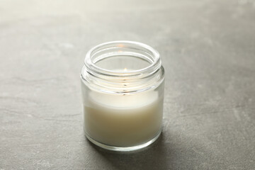 Scented candle for relax on gray background
