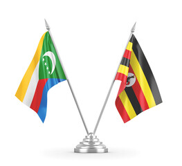 Uganda and Comoros table flags isolated on white 3D rendering