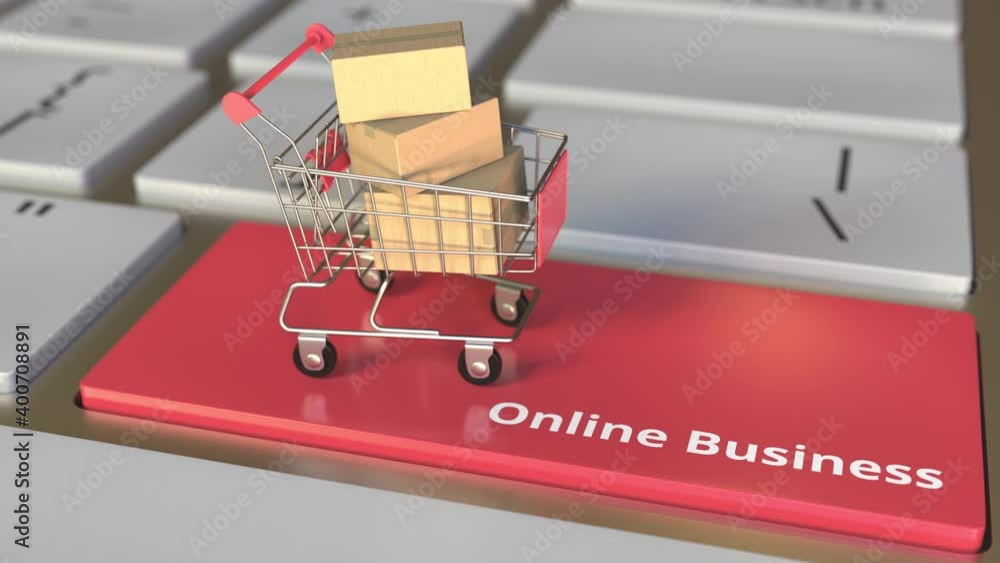 Aufkleber online business text on computer keyboard and boxes in small shopping cart. electronic business conc
