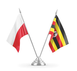 Uganda and Poland table flags isolated on white 3D rendering