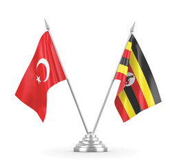 Uganda and Turkey table flags isolated on white 3D rendering