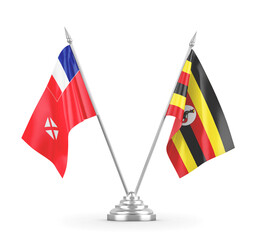Uganda and Wallis and Futuna table flags isolated on white 3D rendering