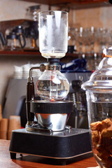 Close up of siphon vacuum coffee maker at cafe