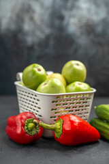 front view fresh bell-peppers with green tomatoes on dark background meal diet health salad food
