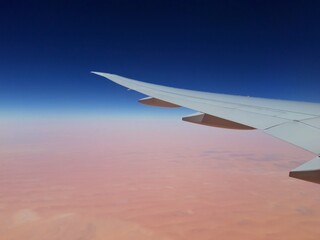 view of sahara desert from airplane window