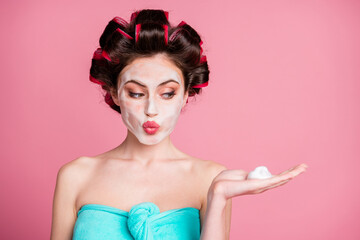 Close-up portrait of pretty cute housewife holding on palm natural soapy mousse pout lips vitality...