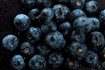 Fresh natural antioxidant blueberries pile, macro detailed close up