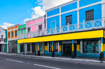 Colorful buildings in a shopping street in the capital city of Nassau, The Bahamas.